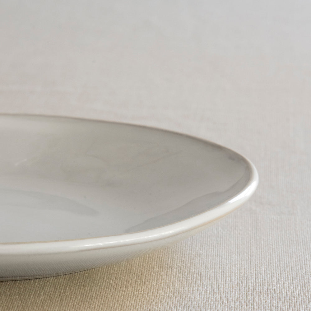 
                      
                        Organic plate white, Ø 21.5 cm
                      
                    