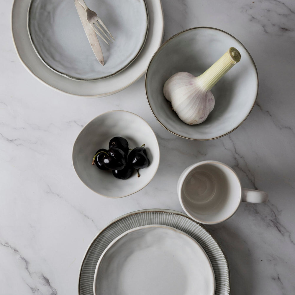 
                      
                        Organic plate white, Ø 21.5 cm
                      
                    